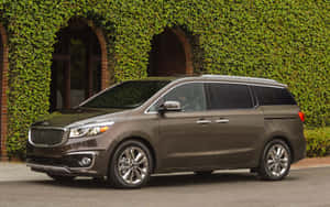 Sleek And Sophisticated Kia Sedona Minivan Wallpaper