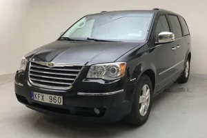 Sleek And Spacious Chrysler Voyager Minivan In A Picturesque Setting Wallpaper