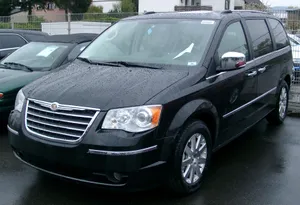 Sleek And Spacious Chrysler Voyager On The Road Wallpaper