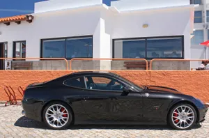 Sleek And Speedy Ferrari 612 Scaglietti In Motion Wallpaper