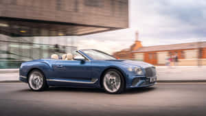 Sleek And Stunning Bentley Continental Gt In Action Wallpaper