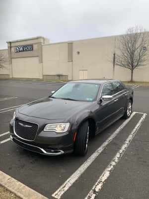 Sleek And Stunning Chrysler 300 On A Scenic Road Wallpaper