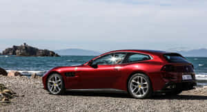 Sleek And Stunning Ferrari Gtc4lusso In Motion Wallpaper