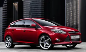 Sleek And Stunning Ford Focus On The Road Wallpaper