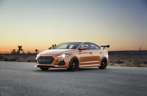 Sleek And Stunning Hyundai Elantra In Action Wallpaper