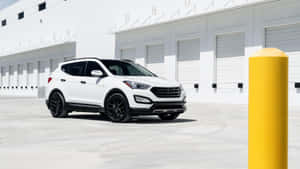 Sleek And Stunning Hyundai Santa Fe In Nature Wallpaper