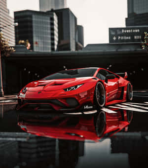 Sleek And Stunning Lamborghini Silhouette In Action Wallpaper