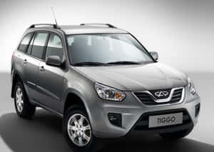 Sleek And Stunning Red Chery Car Wallpaper