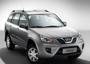 Sleek And Stunning Red Chery Car Wallpaper