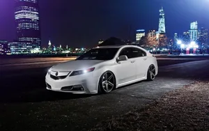 Sleek And Stylish Acura Tl On The Open Road Wallpaper