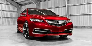 Sleek And Stylish Acura Tlx On The Road Wallpaper