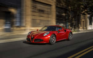 Sleek And Stylish Alfa Romeo 4c On The Road Wallpaper