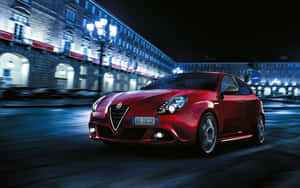 Sleek And Stylish Alfa Romeo Giulietta In Action Wallpaper