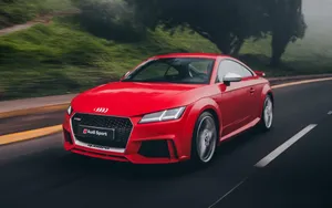 Sleek And Stylish Audi Tt Sports Car Wallpaper