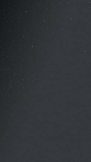 Sleek And Stylish Black Iphone 5s With A Glittering Texture. Wallpaper