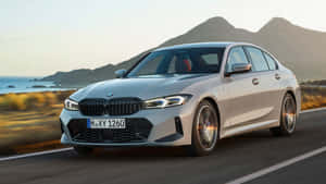 Sleek And Stylish Bmw 3 Series In Action Wallpaper