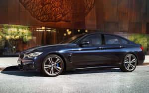 Sleek And Stylish Bmw 4 Series In Motion Wallpaper