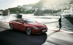 Sleek And Stylish Bmw 6 Series In A Picturesque Setting Wallpaper