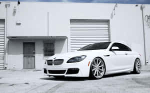 Sleek And Stylish Bmw 6 Series In Action Wallpaper