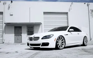 Sleek And Stylish Bmw 6 Series In Action Wallpaper