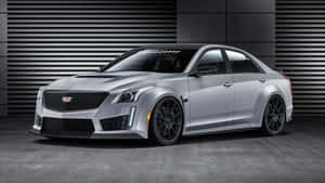 Sleek And Stylish Cadillac Ats On The Road Wallpaper