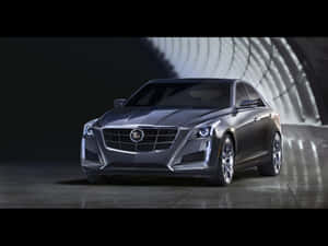 Sleek And Stylish Cadillac Ats On The Road Wallpaper