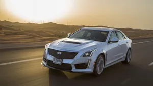 Sleek And Stylish Cadillac Cts Cruising The Streets Wallpaper