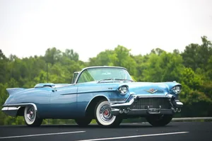 Sleek And Stylish Cadillac Eldorado On The Road Wallpaper