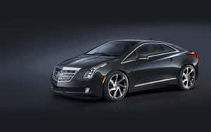 Sleek And Stylish Cadillac Elr On The Open Road Wallpaper