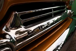 Sleek And Stylish Car Grill Wallpaper