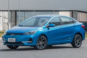 Sleek And Stylish Chery Arrizo 5 In Cityscape Wallpaper