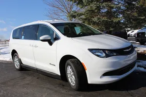 Sleek And Stylish Chrysler Voyager On The Road Wallpaper