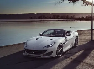Sleek And Stylish Ferrari Portofino Cruising The Open Road Wallpaper