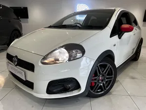 Sleek And Stylish Fiat Punto In Action Wallpaper