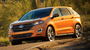 Sleek And Stylish Ford Edge On The Road Wallpaper