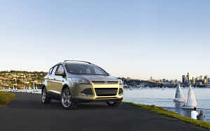 Sleek And Stylish Ford Escape On The Road Wallpaper