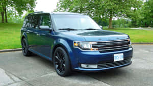 Sleek And Stylish Ford Flex Cruising On The Open Road Wallpaper