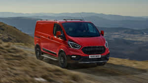 Sleek And Stylish Ford Transit On The Road Wallpaper