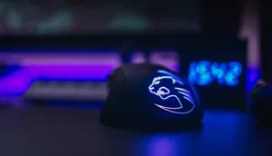 Sleek And Stylish Gaming Mouse Wallpaper