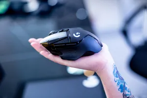 Sleek And Stylish Gaming Mouse Wallpaper