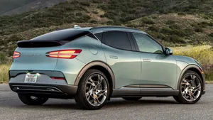 Sleek And Stylish Genesis Gv60 In Motion Wallpaper