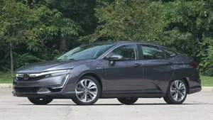 Sleek And Stylish Honda Clarity On The Road Wallpaper