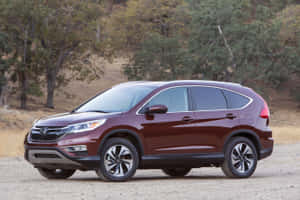 Sleek And Stylish Honda Cr-v On Open Road Wallpaper