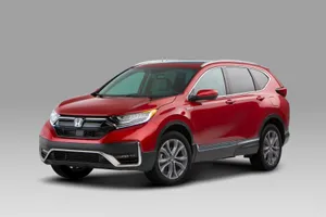 Sleek And Stylish Honda Cr-v On The Road Wallpaper