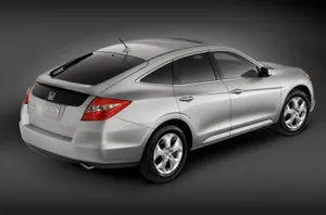 Sleek And Stylish Honda Crosstour Cruising On The Road Wallpaper