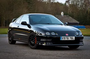 Sleek And Stylish Honda Integra In Its Natural Element Wallpaper