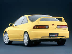 Sleek And Stylish Honda Integra On The Road Wallpaper