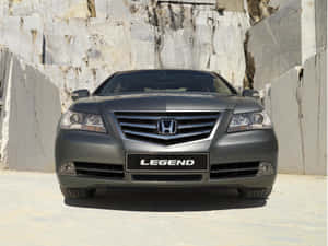 Sleek And Stylish Honda Legend In Action Wallpaper