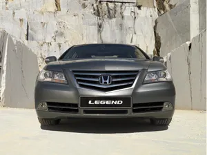 Sleek And Stylish Honda Legend In Action Wallpaper