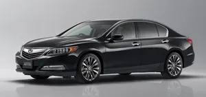 Sleek And Stylish Honda Legend On The Road Wallpaper